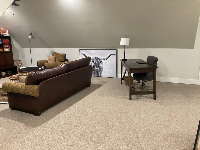 bonus room upstate has another flex room next to this one designed to serve as media room with wall sconces, or extra flex space, storage