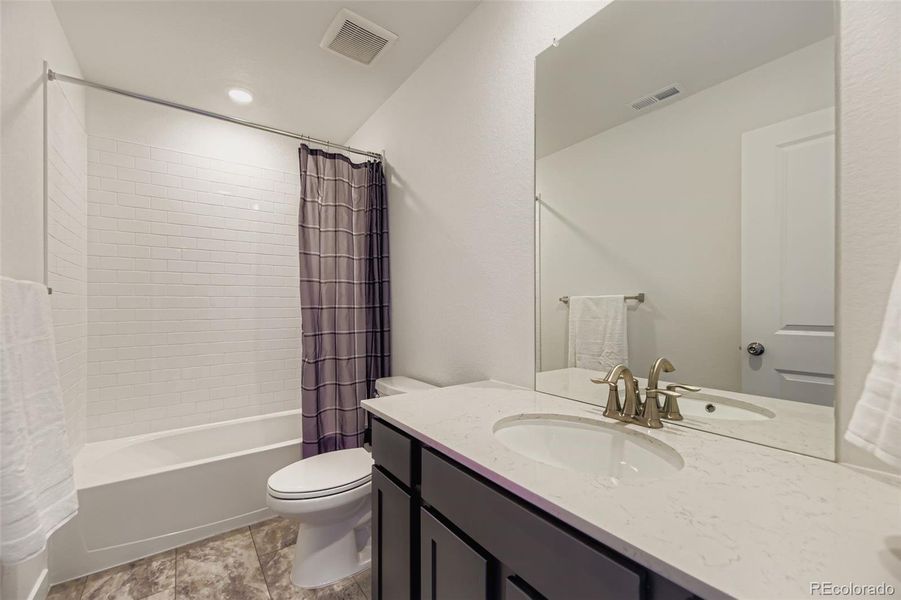 Furnished interior view inside a new home in Newlin Crossing, Parker (Image 17).