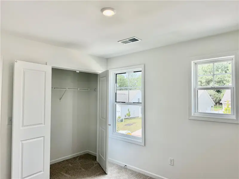 Double windows frame views of the outdoors in this