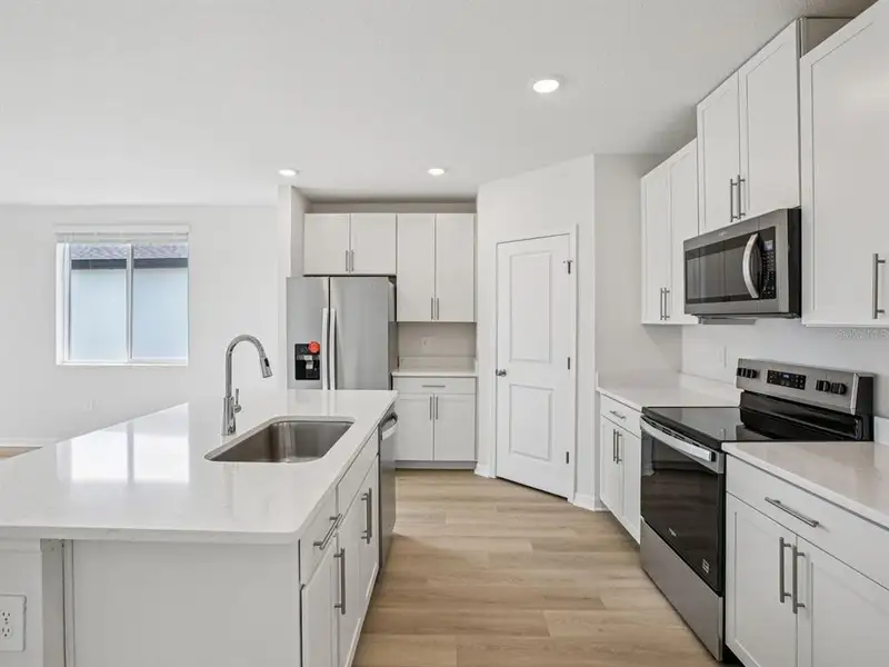 Furnished interior view inside a new home in Magnolia Bay - Classic Series, Nokomis (Image 4).