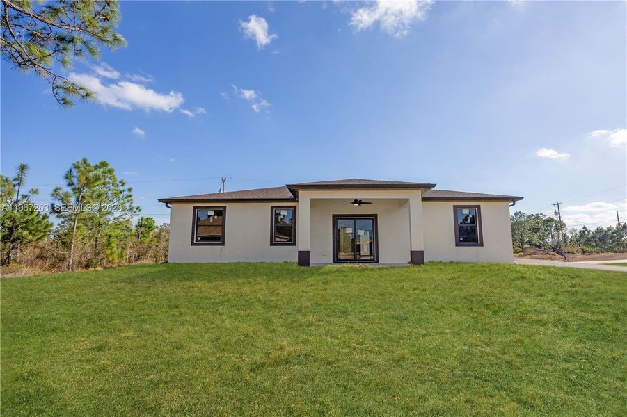 Exterior details and patio area of a home in , Lehigh Acres (Image 3). Exterior details and patio area of a home in , Lehigh Acres (Image 3).