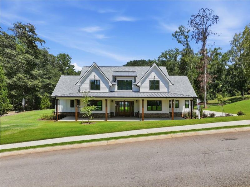 Front exterior of a new home in , Commerce, GA, highlighting curb appeal (Image 25). Front exterior of a new home in , Commerce, GA, highlighting curb appeal (Image 25).