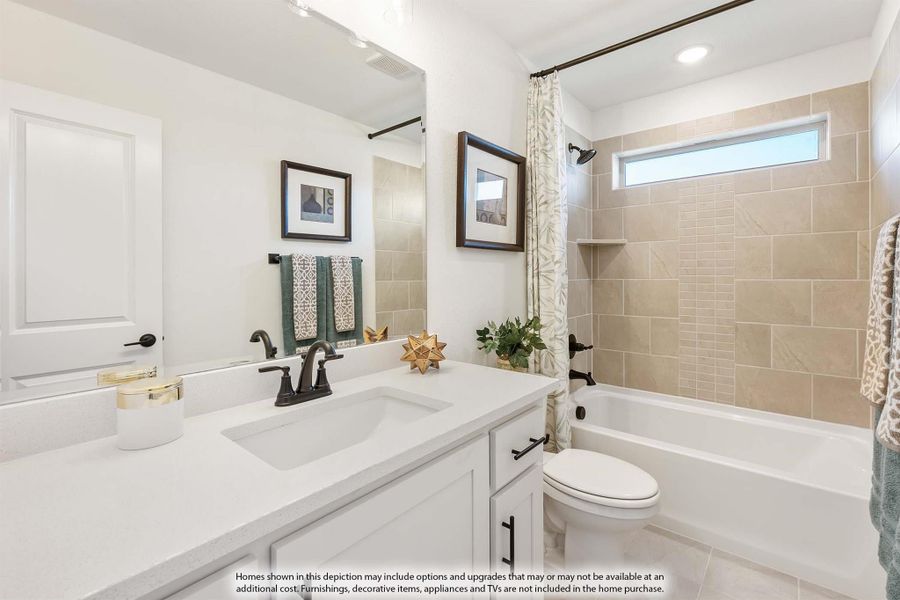 Bathroom with white vanity, quartz countertop, and tiled shower-tub combo with curtain and small window Bathroom with white vanity, quartz countertop, and tiled shower-tub combo with curtain and small window