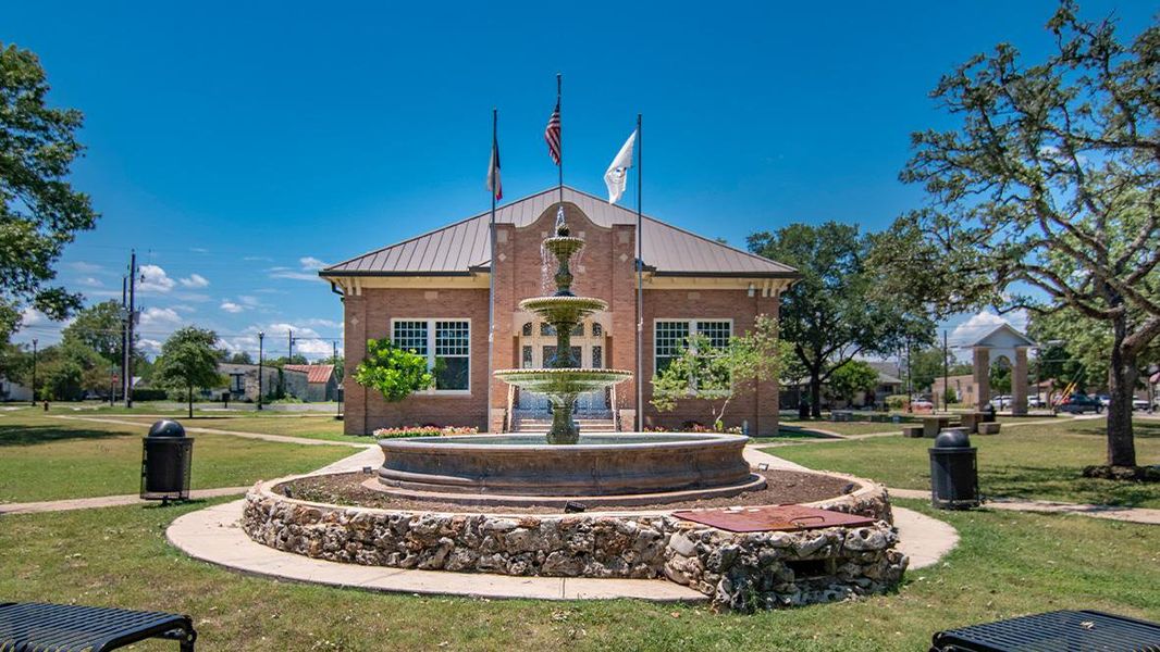 Front exterior of a new home in Paramount, Kyle, TX, highlighting curb appeal (Image 16).