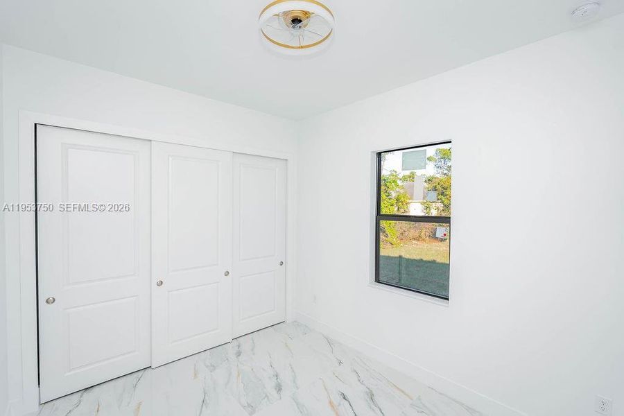 Spacious, unfurnished interior of a new home in , Lehigh Acres (Image 12).