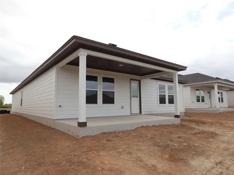Exterior details and patio area of a home in Marble Creek Crossing, Austin (Image 11). Exterior details and patio area of a home in Marble Creek Crossing, Austin (Image 11).