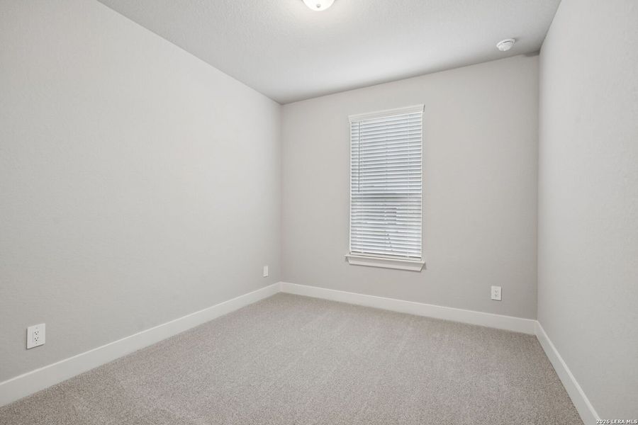 Spacious, unfurnished interior of a new home in Estancia Ranch - Premier Series, San Antonio (Image 35).