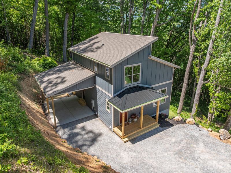Exterior details and patio area of a home in , Waynesville (Image 21).