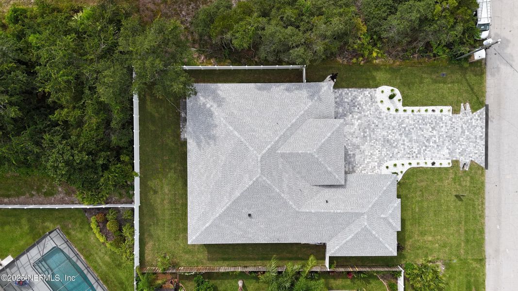Front exterior of a new home in , Palm Coast, FL, highlighting curb appeal (Image 25). Front exterior of a new home in , Palm Coast, FL, highlighting curb appeal (Image 25).