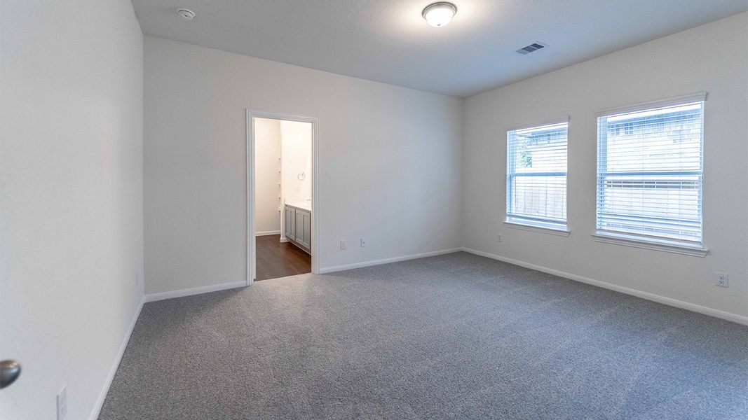 Spacious, unfurnished interior of a new home in The Canopies, Splendora (Image 17).
