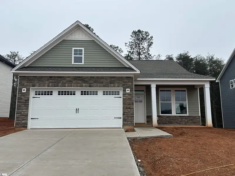 Front exterior of a new home in Shiloh Trail, Wellford, SC, highlighting curb appeal (Image 2).