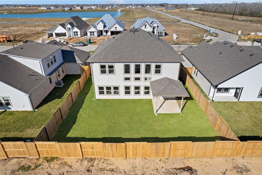 Exterior details and patio area of a home in , Manvel (Image 24).