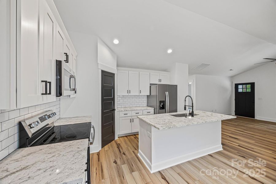 Furnished interior view inside a new home in , Concord (Image 5).