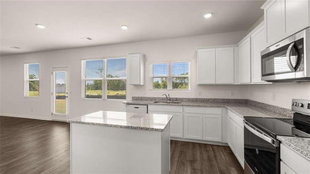 Furnished interior view inside a new home in Oakchase at Hampton, Hampton (Image 2). Furnished interior view inside a new home in Oakchase at Hampton, Hampton (Image 2).