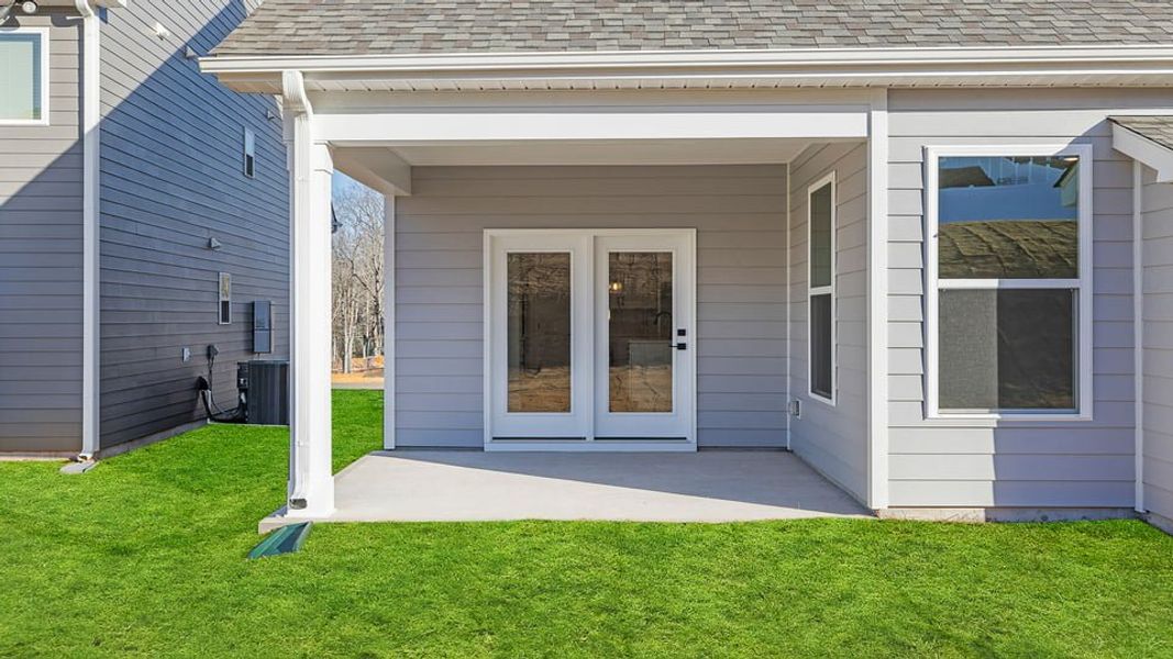 Exterior details and patio area of a home in Whitehawk Meadows, Travelers Rest (Image 22).