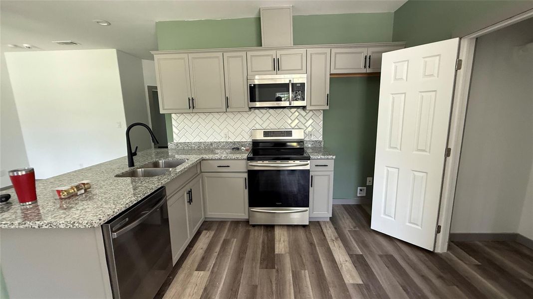 Furnished interior view inside a new home in , Conroe (Image 5).
