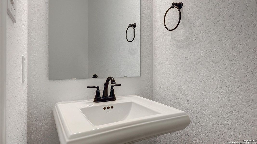 Furnished interior view inside a new home in Kallison Ranch 60', San Antonio (Image 8).