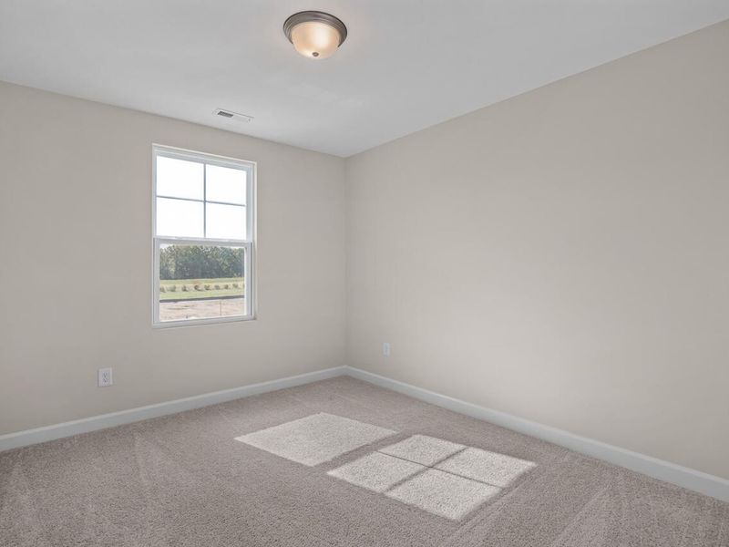 Spacious, unfurnished interior of a new home in Springvale, Fuquay Varina (Image 21).