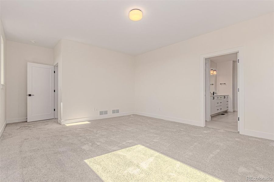 Spacious, unfurnished interior of a new home in West Grange, Longmont (Image 32).