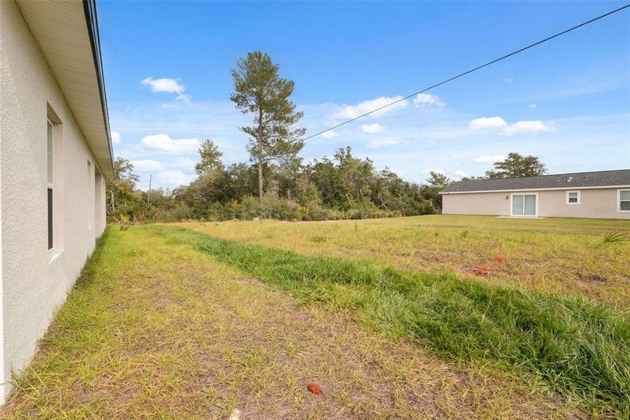 Exterior details and patio area of a home in , Ocala (Image 19).