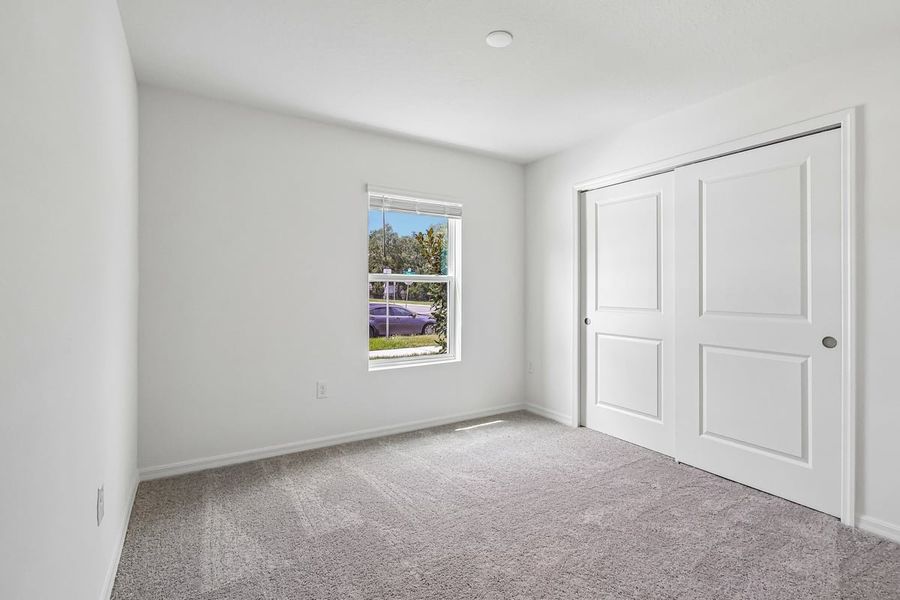 Spacious, unfurnished interior of a new home in Hilliard Ridge, Kissimmee (Image 22).