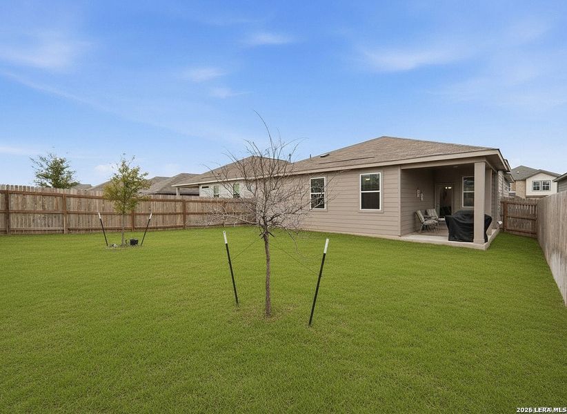Exterior details and patio area of a home in Hunter's Ranch, San Antonio (Image 21).