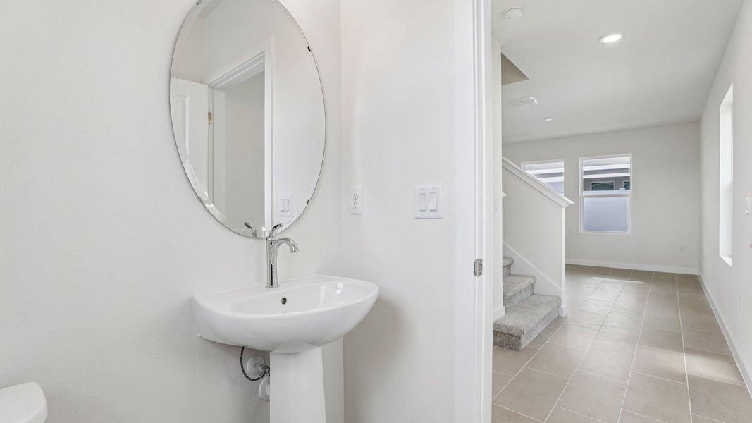 Furnished interior view inside a new home in Cyrene at Harmony, St. Cloud (Image 34).