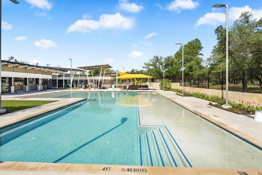 A refreshing in-ground pool awaits, perfect for leisure and recreation under the sun.