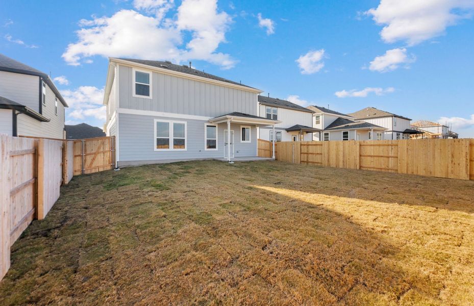 Exterior details and patio area of a home in Patterson Ranch, Georgetown (Image 24).