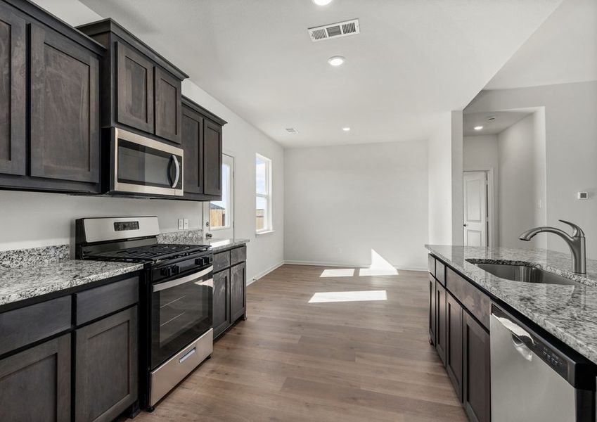 The dining room sits right off of the kitchen.