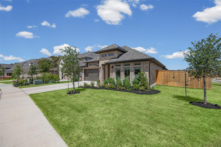 Front exterior of a new home in , Georgetown, TX, highlighting curb appeal (Image 24). Front exterior of a new home in , Georgetown, TX, highlighting curb appeal (Image 24).