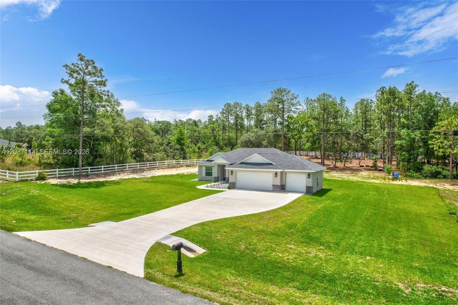 Front exterior of a new home in , Ocala, FL, highlighting curb appeal (Image 20).