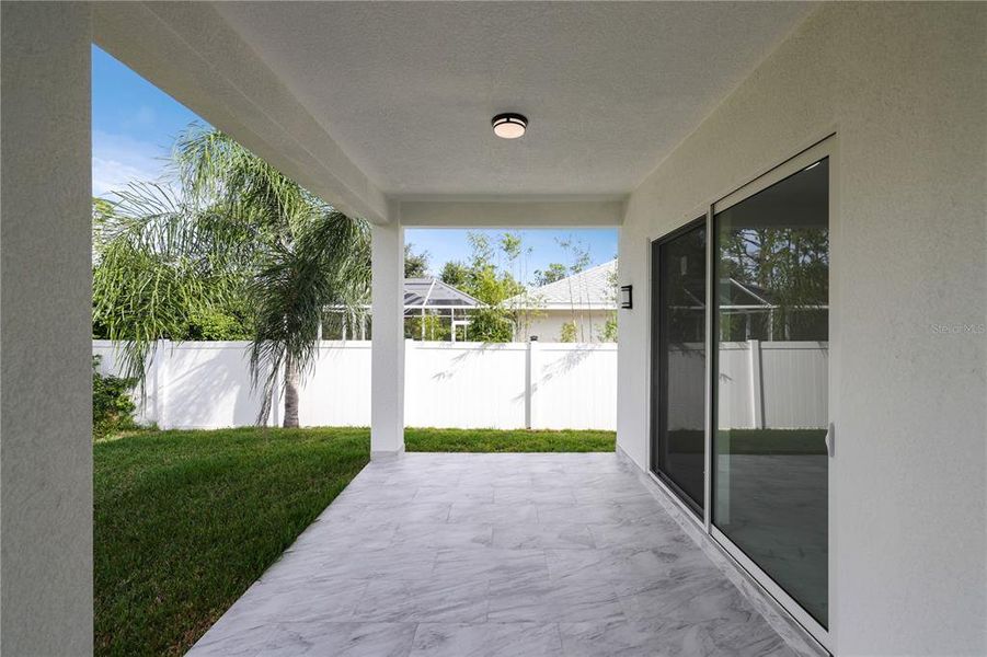 Exterior details and patio area of a home in , Rotonda West (Image 4).
