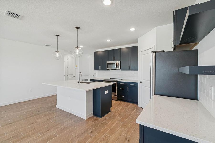 Furnished interior view inside a new home in Aspire at Canter Creek, Davenport (Image 13).