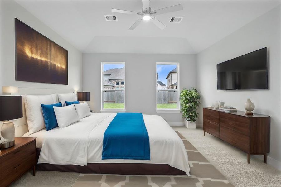 Come and unwind after a long day in this magnificent master suite! This spacious room features plush carpet, warm paint, sitting area, high ceilings, beautiful custom ceiling fan, and large windows with privacy blinds!