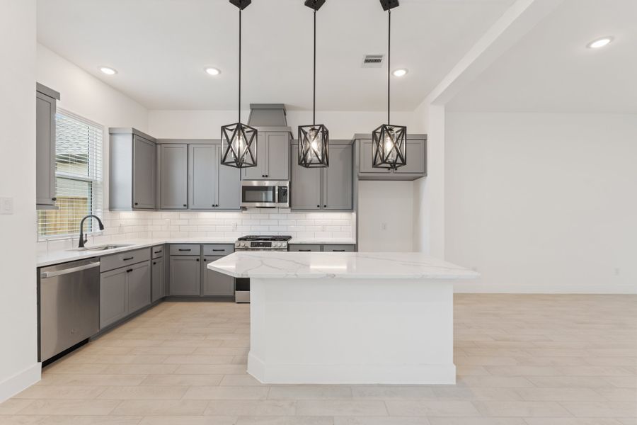 Furnished interior view inside a new home in Meridiana, Manvel (Image 15).