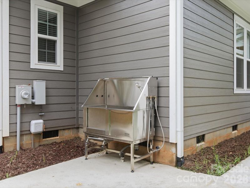 Exterior details and patio area of a home in , Waxhaw (Image 33).