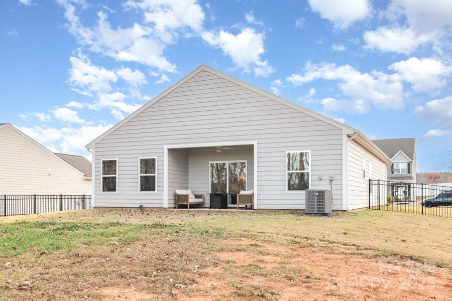 Exterior details and patio area of a home in , Troutman (Image 4).