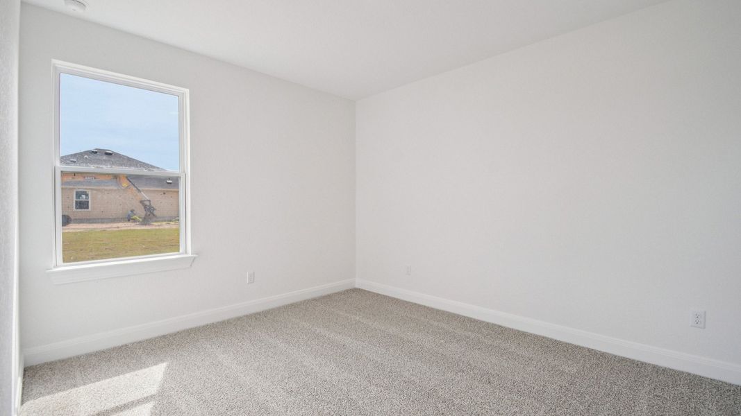 Spacious, unfurnished interior of a new home in Railhead, Cedar Creek (Image 21).