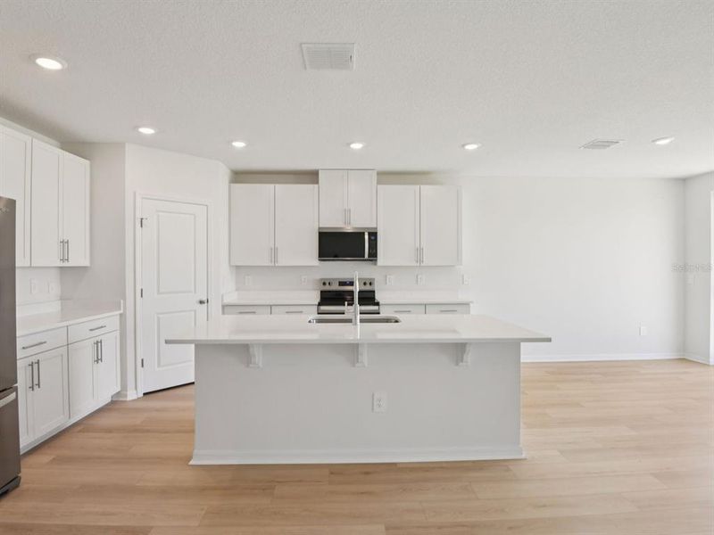 Furnished interior view inside a new home in Oakfield Trails - Classic Series, Parrish (Image 6).