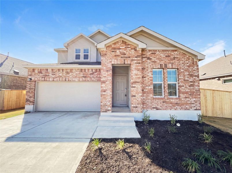 Front exterior of a new home in The Colony, Bastrop, TX, highlighting curb appeal (Image 20).