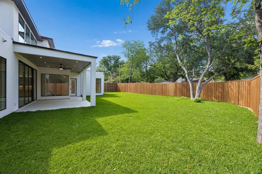 Huge yard room for a pool and play.