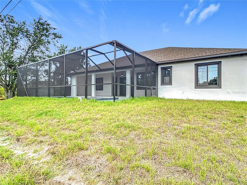 Front exterior of a new home in , Englewood, FL, highlighting curb appeal (Image 2). Front exterior of a new home in , Englewood, FL, highlighting curb appeal (Image 2).