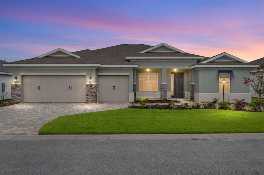 Front exterior of a new home in On Top of the World Communities, Ocala, FL, highlighting curb appeal (Image 19).