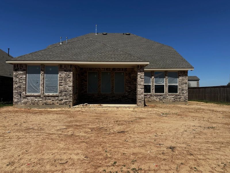 Exterior details and patio area of a home in Sunterra, Katy (Image 3).