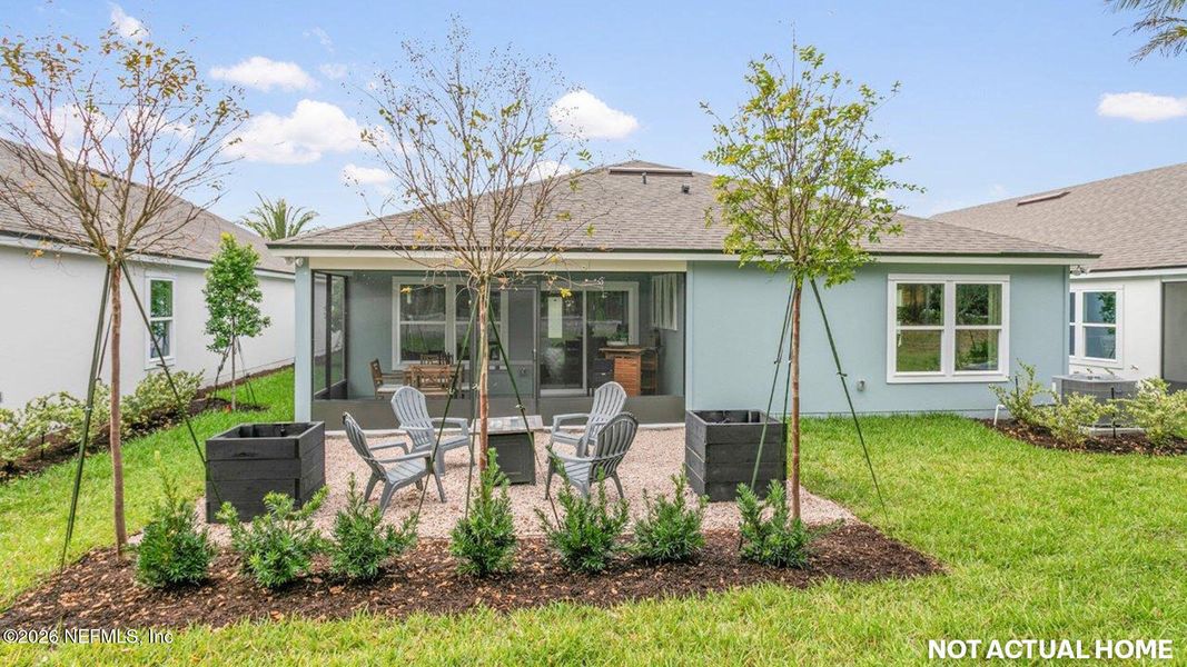 Exterior details and patio area of a home in Sawmill Branch, Palm Coast (Image 2).