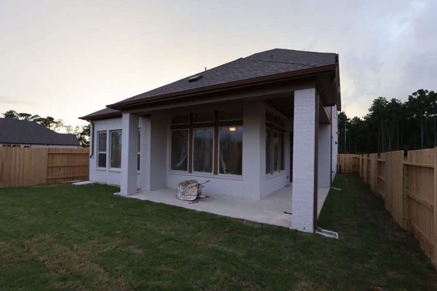 Front exterior of a new home in ARTAVIA 45' Homesites, Conroe, TX, highlighting curb appeal (Image 2).