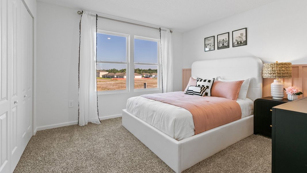 Representative furnished interior of a home built from the HAYDEN by D.R. Horton in Rookery, Green Cove Springs (Image 29).