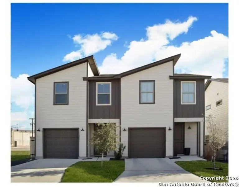 Front exterior of a new home in Van Cleave, San Antonio, TX, highlighting curb appeal (Image 1).