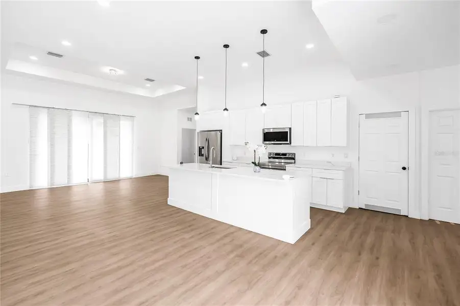Furnished interior view inside a new home in , Clewiston (Image 5).